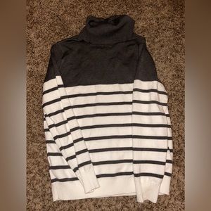 Grey and white striped turtle neck sweater